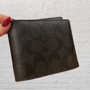 Men’s dark brown Coach wallet